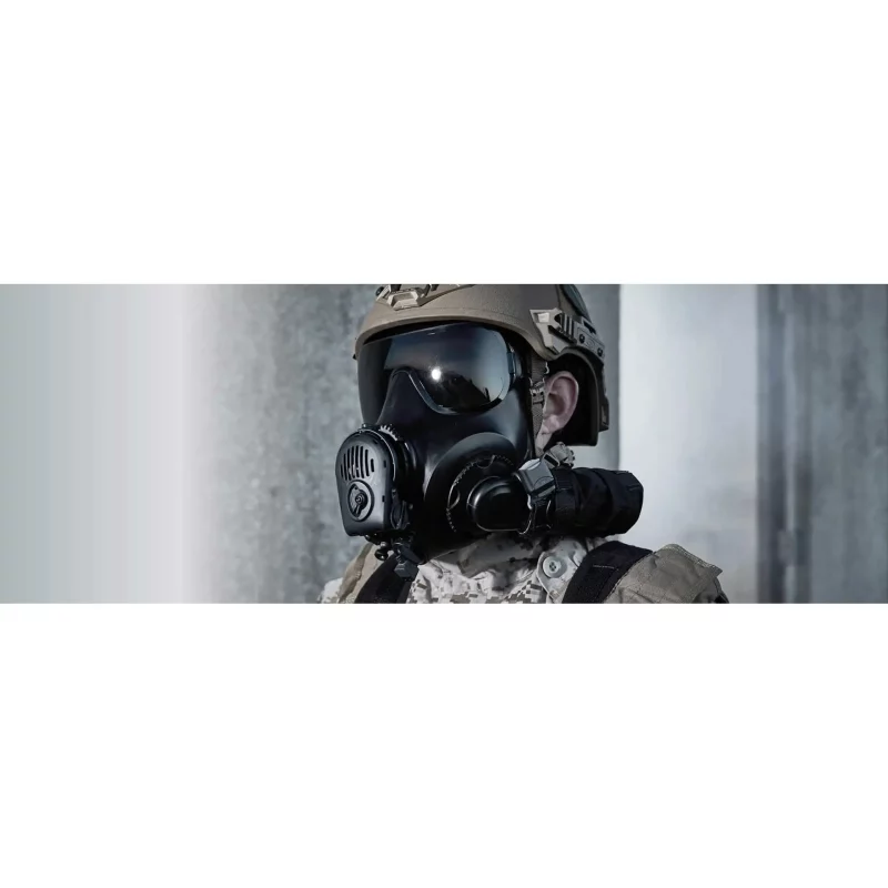 Military soldier wearing Avon Protection FM53™ Air Purifying Respirator during tactical field operations for enhanced respiratory safety.