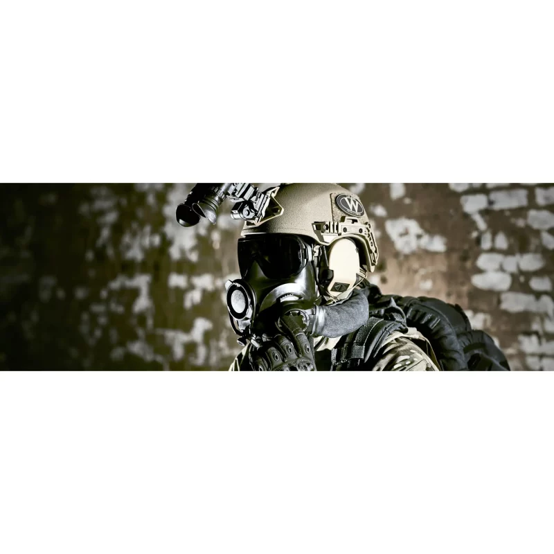 Military soldier equipped with Avon Protection FM54™ Air Purifying Respirator in field deployment for enhanced respiratory safety.