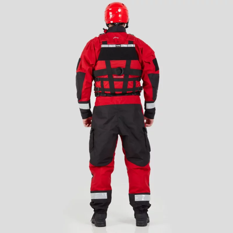 Back view of a man wearing the NRS Extreme SAR Dry Suit in red with a red equipment bag on the chest, displaying reinforced panels and reflective elements.