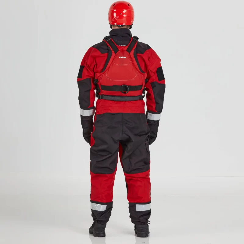 Back view of a man wearing the NRS Ascent SAR Dry Suit in red with a red equipment bag on the chest, showing reinforced back panels and safety features.