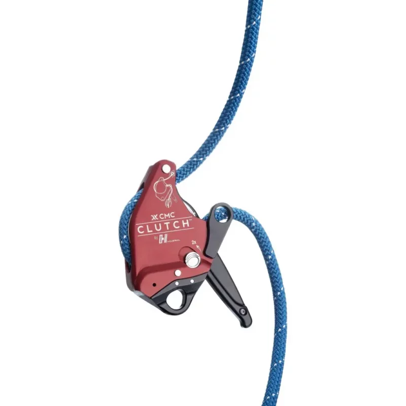 Top view of the red Harken™ CMC CLUTCH™ in the closed position with rope loaded, showing cam engagement, rope path, and secure holding mechanism.