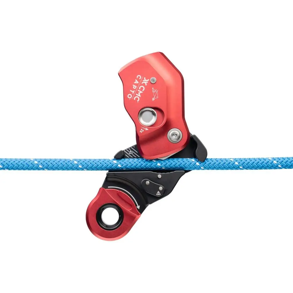 Red CMC™ CAPTO™ Multifunctional Rope Grab in the open position engaged on a rope, demonstrating secure rope grip and smooth operation for technical rescue and fall protection.