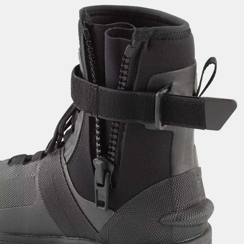 Closeup of a single NRS Workboot Wetshoe’s left side with the zipper and Velcro strap opened, showing the easy-entry design and secure fit features.