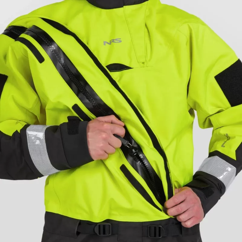 Closeup of a man wearing the NRS Extreme SAR Dry Suit in safety yellow, adjusting the waterproof front zipper at chest level.