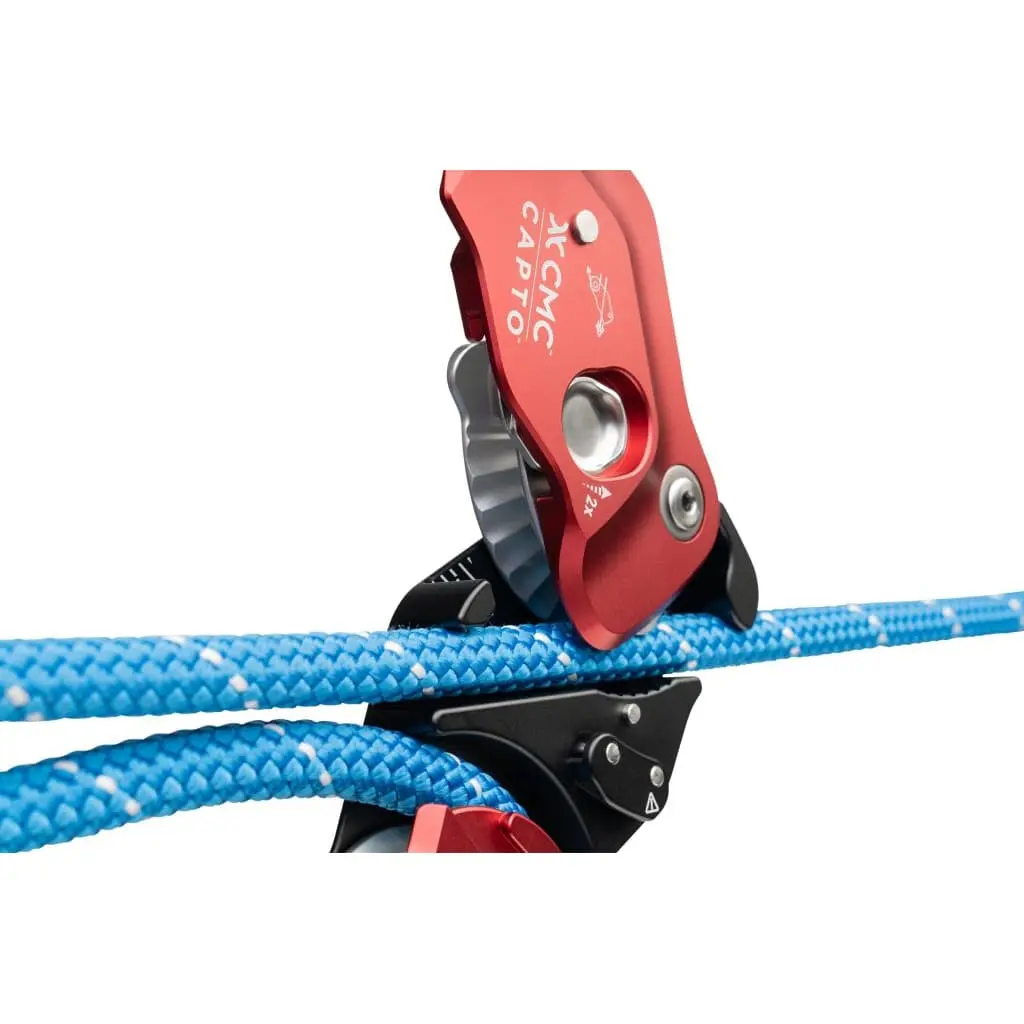 Red CMC™ CAPTO™ Multifunctional Rope Grab in the open position with rope fed twice through the device, demonstrating enhanced grip and control for technical rescue and rope access tasks.