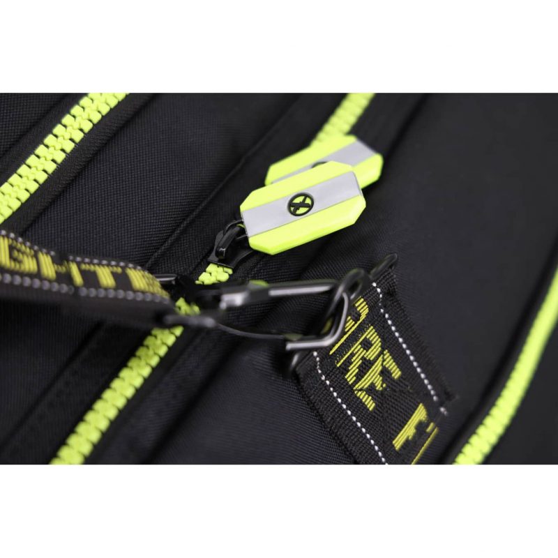 Closeup of zipper located next to carrying strap hook on Lightning X LXFB10 black variant, highlighting secure closure and attachment points.
