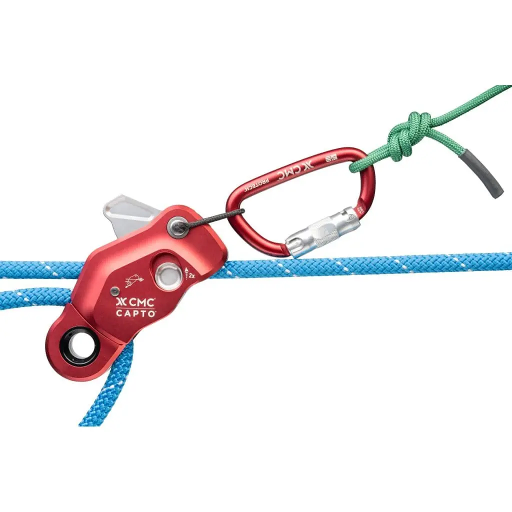Red CMC™ CAPTO™ Multifunctional Rope Grab in the closed position with rope fed twice through the device and a carabiner attached, showcasing secure locking and reliable connection for safe rescue and rope access operations.