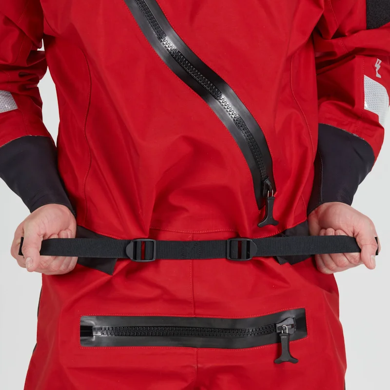 Closeup of a man wearing the NRS Ascent SAR Dry Suit in red, gripping the adjustable waist straps for a secure fit.