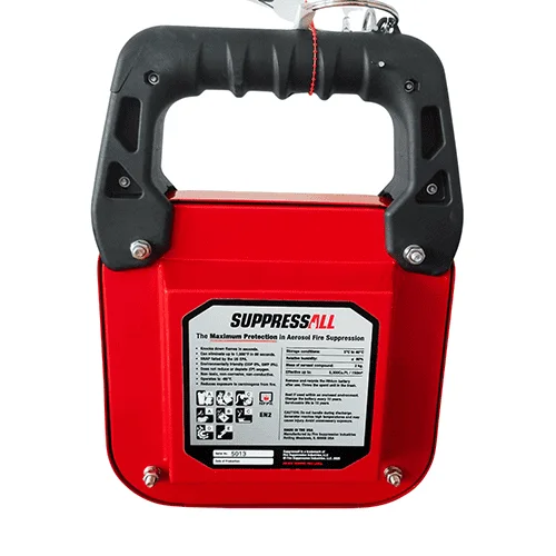 SUPPRESSALL™ FS2 aerosol fire suppression tool in red with a black rubber-grip carry handle on top, shown from the front with a white product label listing safety and usage information, hardware screws at the corners, and a metal hanging loop at the top.