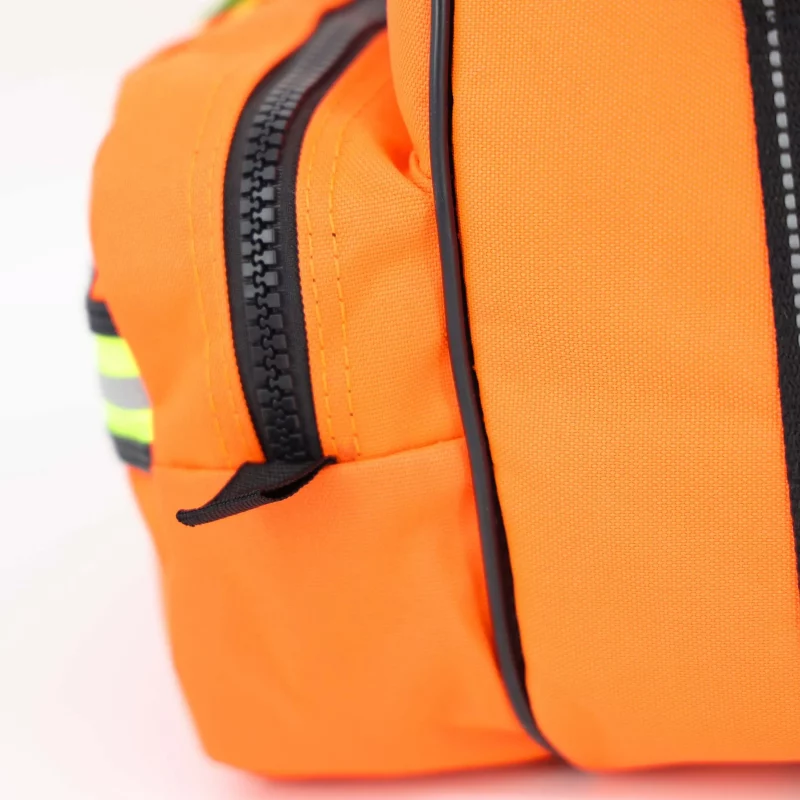 Closeup of Lightning X LXMB30 orange variant side panel, emphasizing reinforced stitching and heavy-duty fabric.