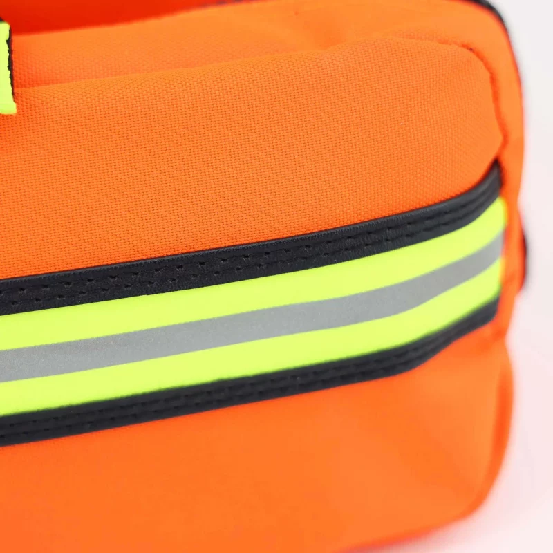 Alternate closeup side view of Lightning X LXMB30 orange variant large EMT first responder bag, highlighting durable fabric texture and reinforced side stitching.