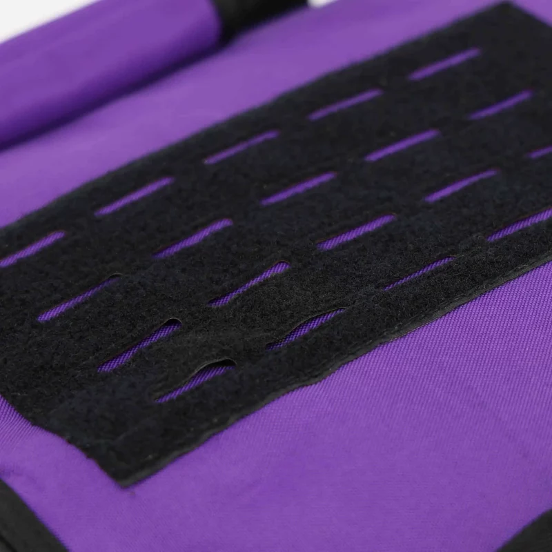Closeup of top section of Lightning X LXMB30 purple variant large EMT first responder bag, highlighting reinforced fabric and textured surface.