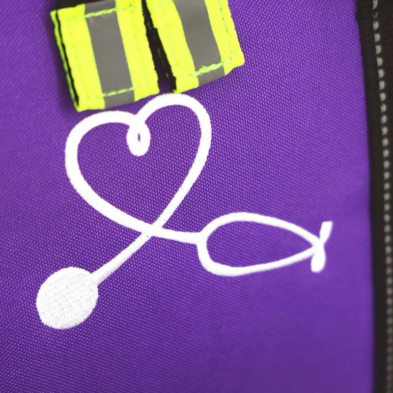 Closeup of medical emblem on Lightning X LXMB30 purple variant, displaying clear identification for emergency use.
