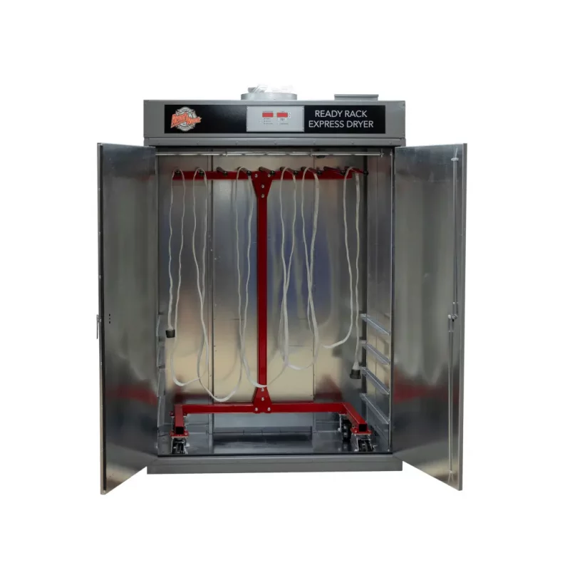 Ready Rack™ Hose Drying Rack empty inside an express dryer, showcasing its sturdy design and efficient placement for rapid drying of fire hoses.