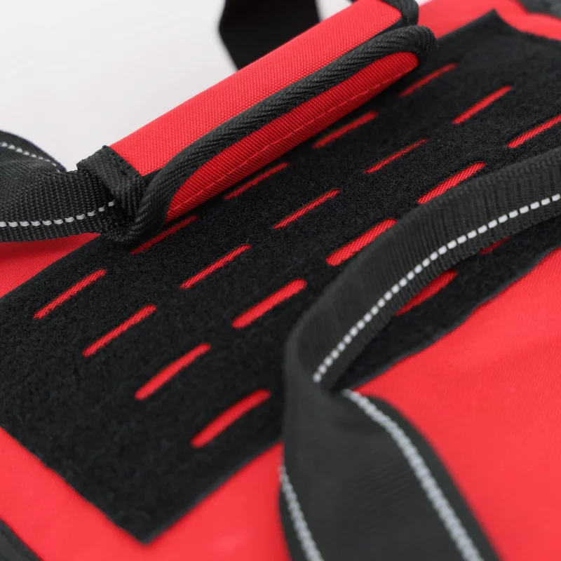 Closeup of top section of Lightning X LXMB30 red variant large EMT first responder bag, highlighting reinforced fabric and textured surface.
