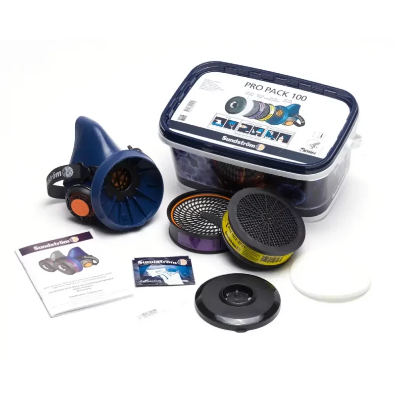 Sundström® SR 100 M/L ProPack Respirator Kit with lid shut next to all its contents — compact respiratory protection kit shown closed alongside its chemical cartridges, particulate filters, half mask, and accessories laid out for clear identification.