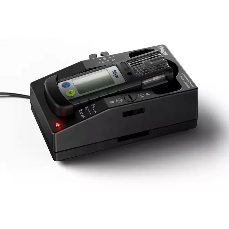Dräger X-am® 2800 Multi-Gas Detector laying down in its charging cradle with charging cable connected.