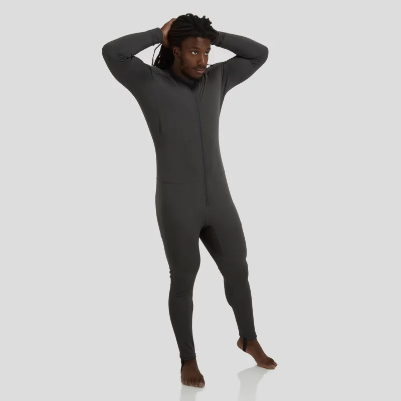 Front side view of a man wearing the NRS Men’s Expedition Weight Union Suit, highlighting the form-fitting design, full-length zipper, and thermal fleece fabric.