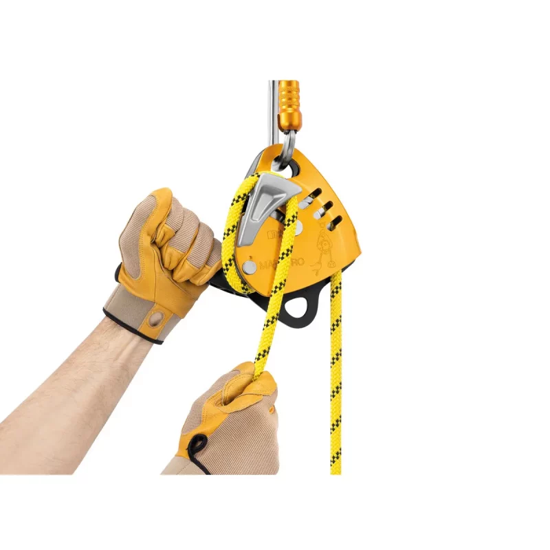 Petzl® MAESTRO® S Descender in use with rope fed, showcasing secure and controlled rope handling for rescue and descent activities.