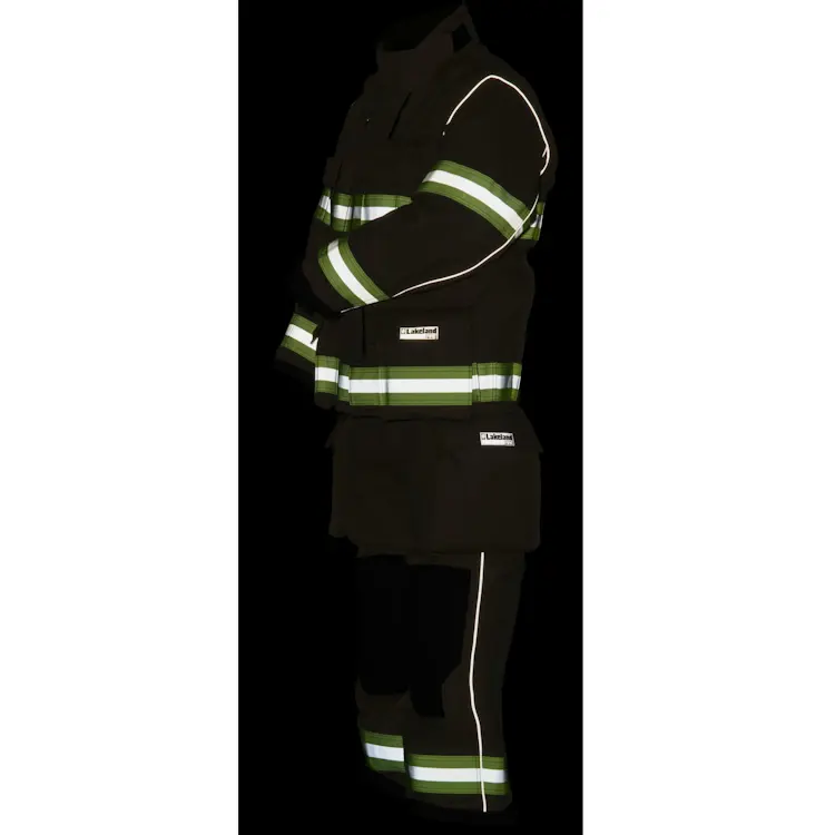 Lakeland® Stealth Premium Turnout Pants shown in low light at night, with reflective trim visible for enhanced firefighter safety and visibility in dark conditions.