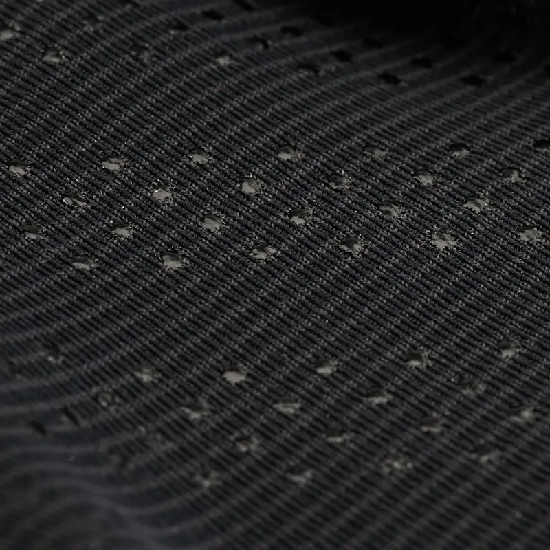 Closeup of the NRS Men’s HydroSkin Glove material, displaying the thin, flexible neoprene with thermal lining and water-resistant coating.