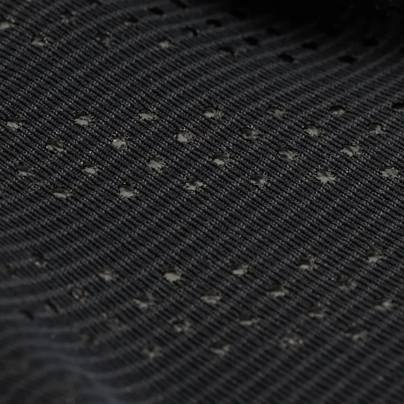 Closeup of the NRS Men’s HydroSkin Glove material, displaying the thin, flexible neoprene with thermal lining and water-resistant coating.