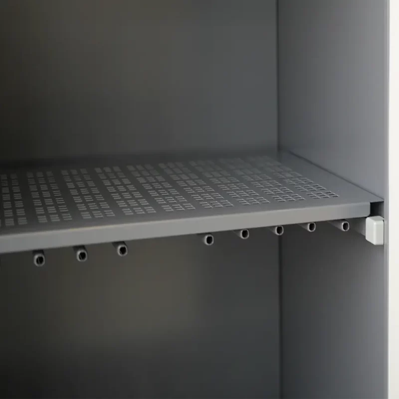 Closeup of adjustable shelf inside Ready Rack™ Vortex DC2 Drying Cabinet — 2-Gear, designed to securely hold turnout gear during drying cycles.