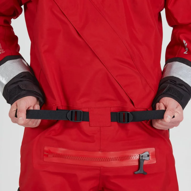 Closeup of a man wearing the NRS Extreme SAR Dry Suit in red, pulling the adjustable waist straps for a secure fit.