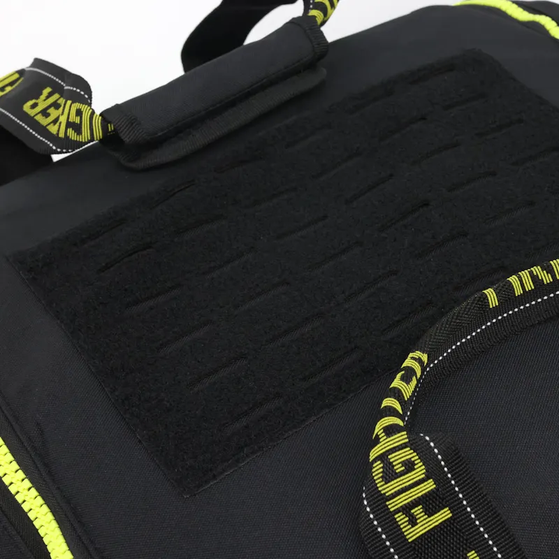 Close-up of the Lightning X LXFB20 black turnout gear bag's top hook-and-loop patch panel for attaching name tags or custom patches.