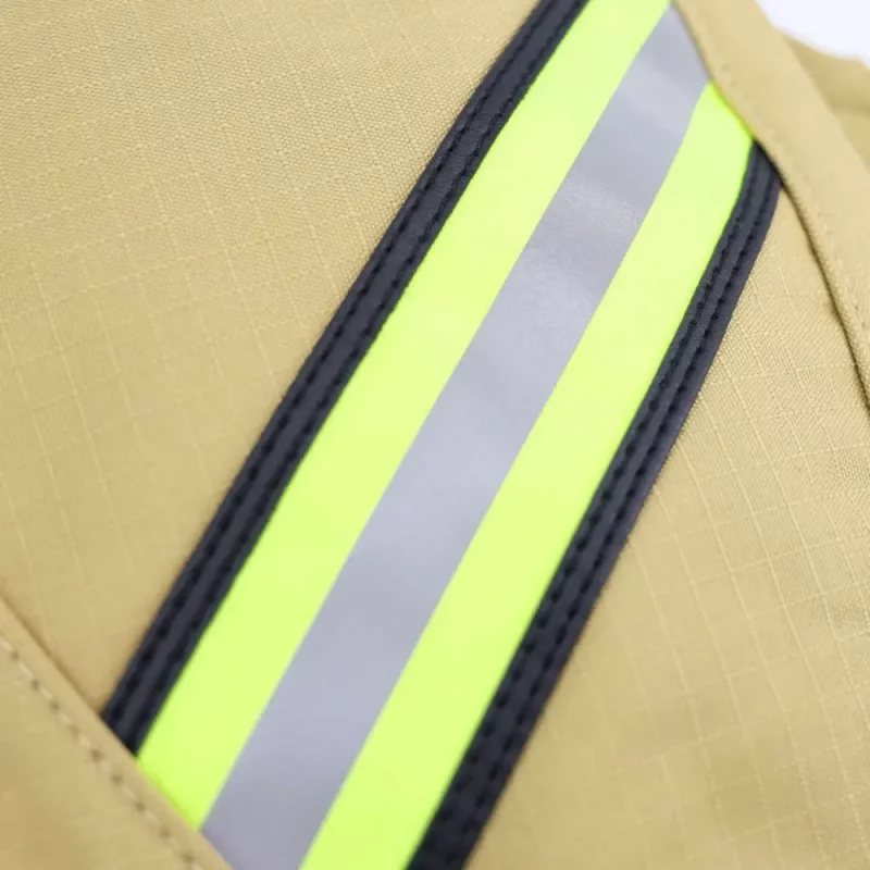 Closeup of reflective fluorescent yellow stripe on Lightning X LXFB30-XT Ripstop SCBA mask bag, emphasizing high visibility for safety.