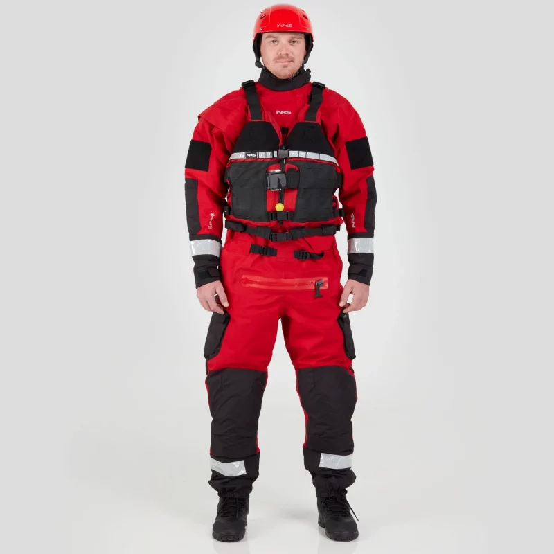 Front view of a man wearing the NRS Extreme SAR Dry Suit in red with a red equipment bag on the chest, showing rescue-ready gear placement.