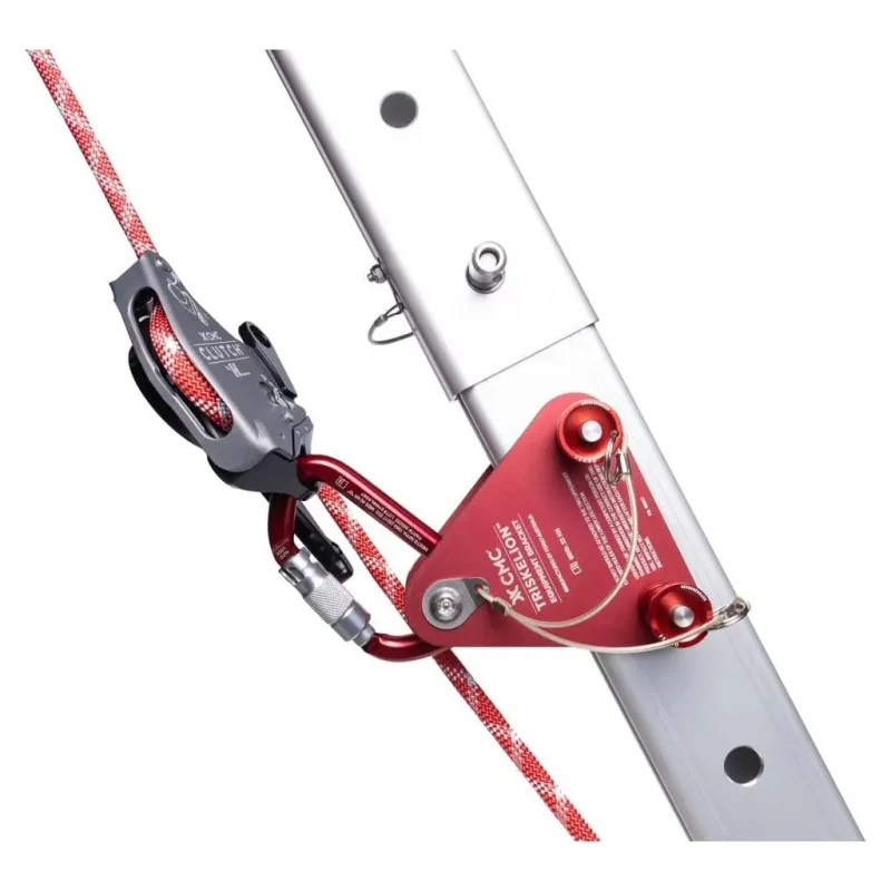 Wider view of the CMC™ Triskelion™ tripod leg equipped with an equipment bracket, rope, carabiner, and a CMC™ Clutch device, showcasing a complete and organized rescue rigging setup.