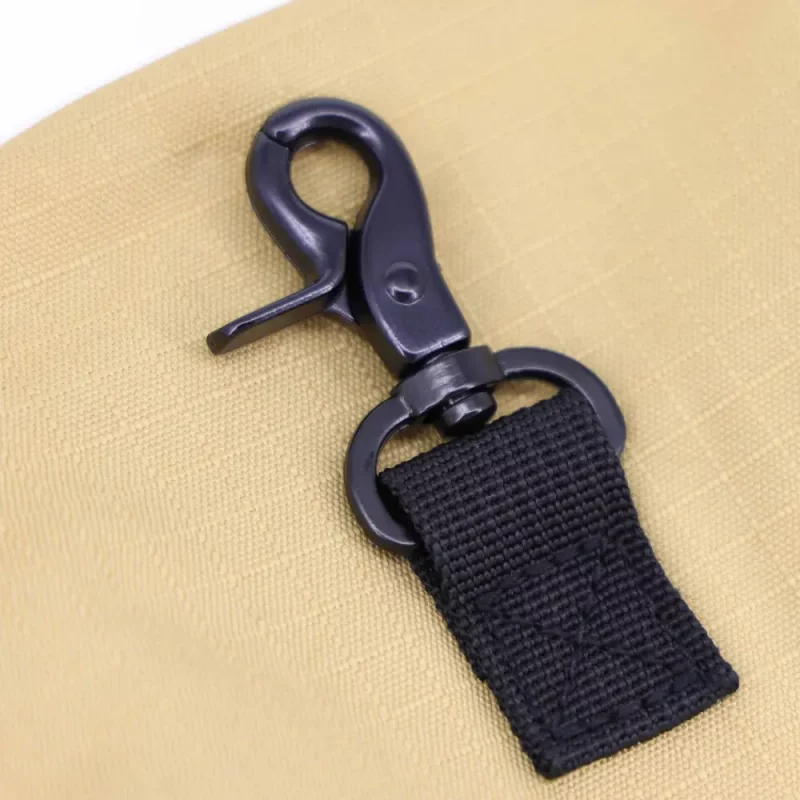 Closeup of carrying hook on the back of Lightning X LXFB30-XT Ripstop SCBA mask bag, showing sturdy attachment hardware.