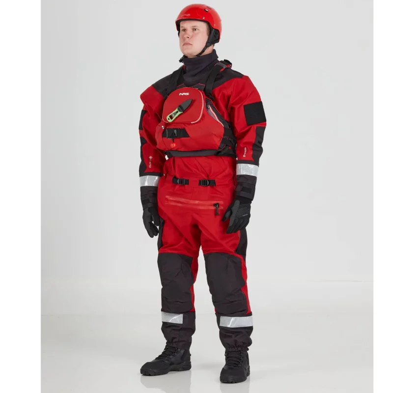 Front side view of a man wearing the NRS Ascent SAR Dry Suit in red with a red equipment bag on the chest, showcasing the waterproof material and rescue gear readiness.