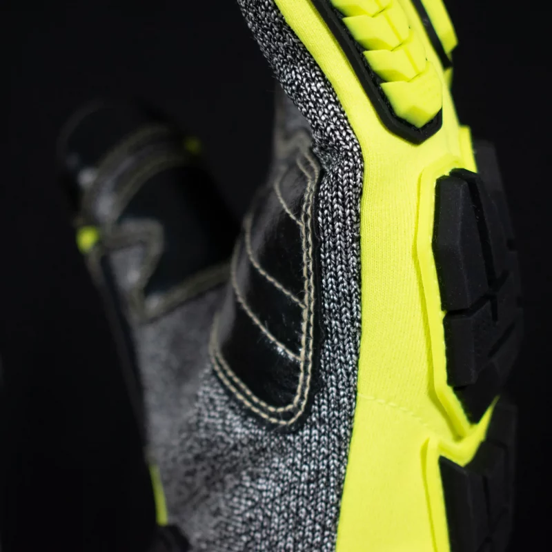 Close-up of the palm side of a single Majestic Safety MFA15B glove showcasing textured grip and multi-layer protection including bloodborne pathogen barrier.