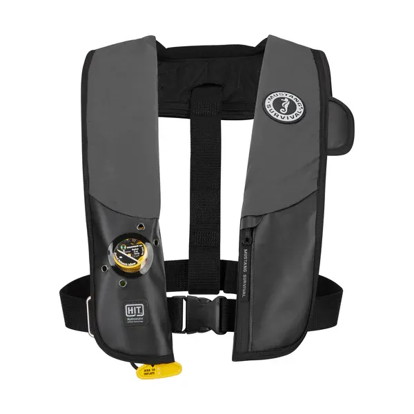 Front view of Mustang Survival® Hit Hydrostatic Inflatable PFD in gray/black variant, showing adjustable straps, compact design, and hydrostatic inflation mechanism for enhanced safety.