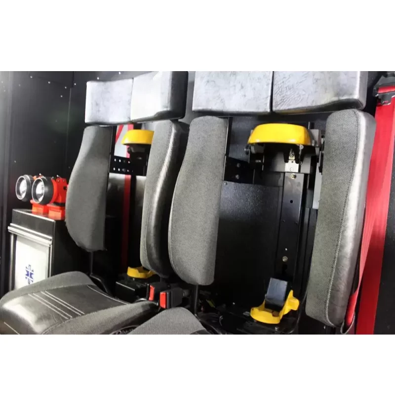 Two empty Ziamatic™ Hands-Free Electric Brackets mounted on firetruck seats, ready to securely hold equipment for hands-free, rapid access during emergencies.