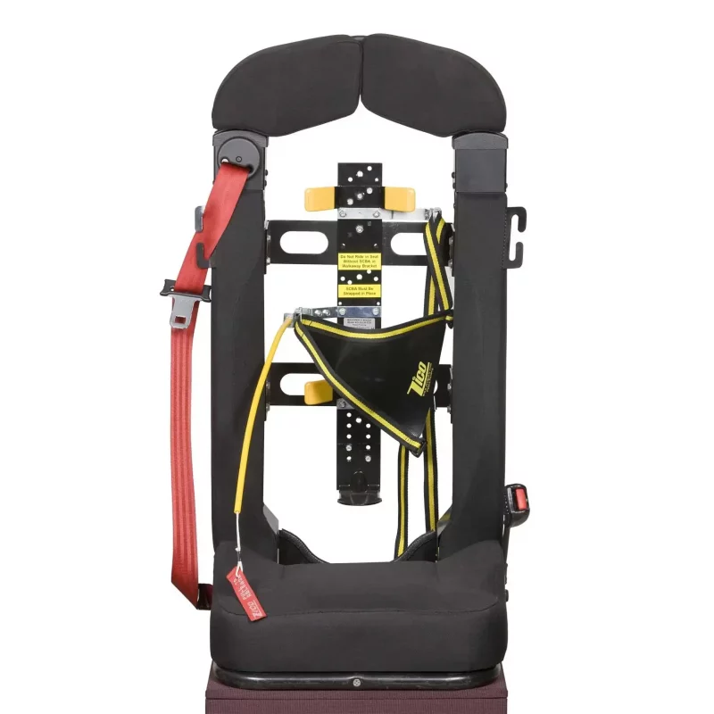 Ziamatic™ EZ-OUT SCBA Bracket mounted on a firetruck seat, empty and ready to securely hold a self-contained breathing apparatus (SCBA) for quick access during emergencies.