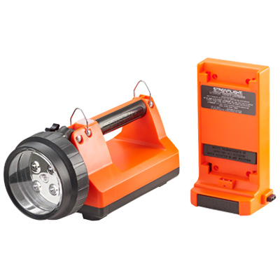 Streamlight® E-Flood® FireBox® lantern displayed next to its detached rechargeable battery pack, highlighting the modular design, power connection points, and rugged emergency lighting construction.