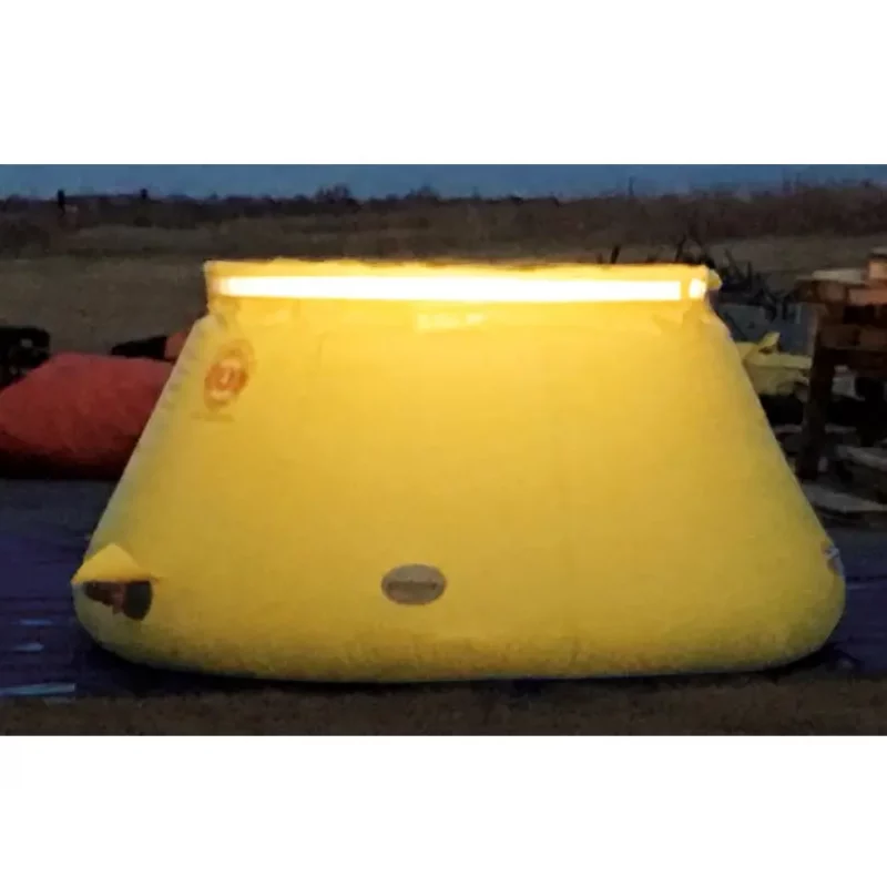 Side view of a Husky® Self-Supporting Frameless Portable Water Tank, showing its freestanding, collapsible design ideal for rapid water storage deployment in firefighting and emergency situations.