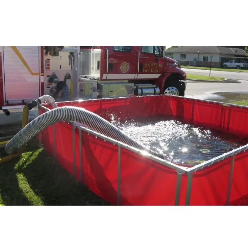 Husky® Power Jet Siphon in use with a water tank, demonstrating rapid water transfer and efficient siphoning during firefighting or industrial fluid handling operations.