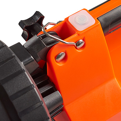 Close-up of the Streamlight® E-Flood® FireBox® lantern’s tilting knob, highlighting its textured grip and sturdy construction for easy angle adjustment of the LED light head.