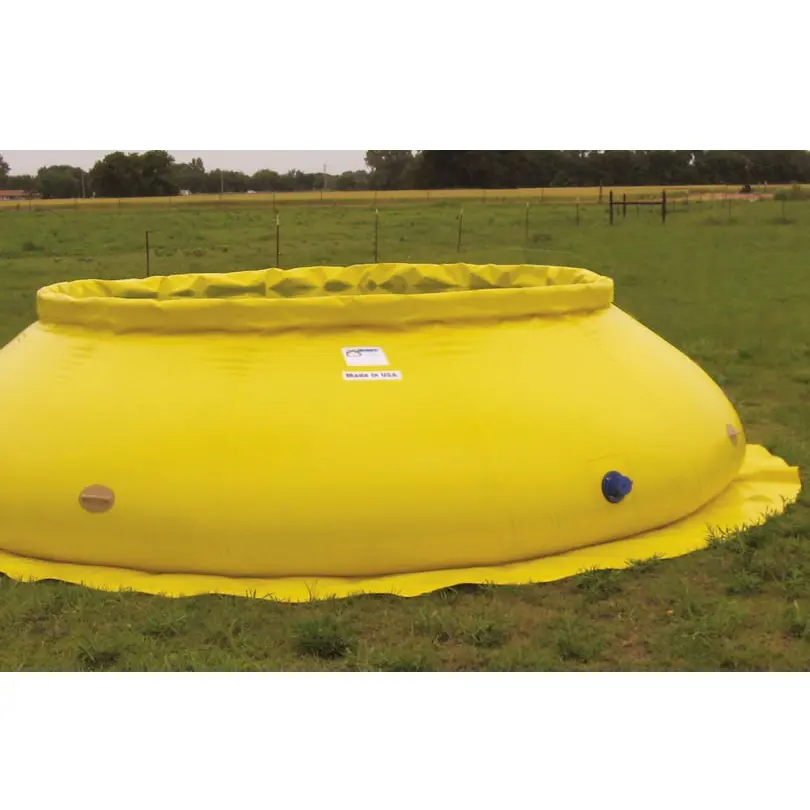Yellow Husky® self-supporting water tank with a flared base and blue side outlet on a matching yellow Husky® ground tarp in a grassy field.