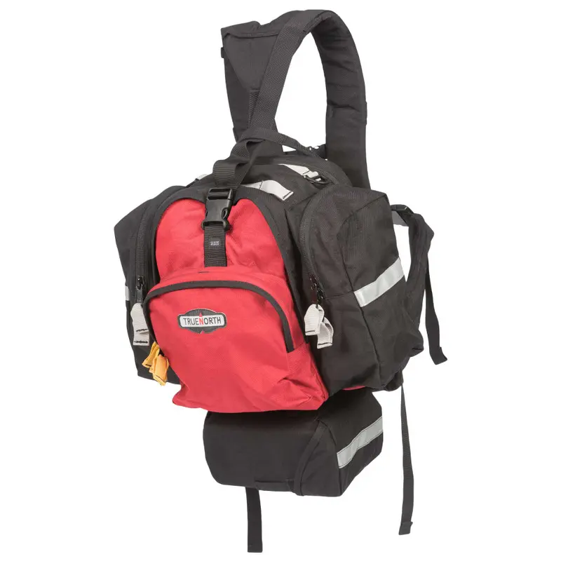 Front side view of the red True North Gear Spitfire™ Pack, highlighting multiple exterior pockets, durable fabric, and reinforced stitching for organized and rugged use in wildland firefighting and emergency response.