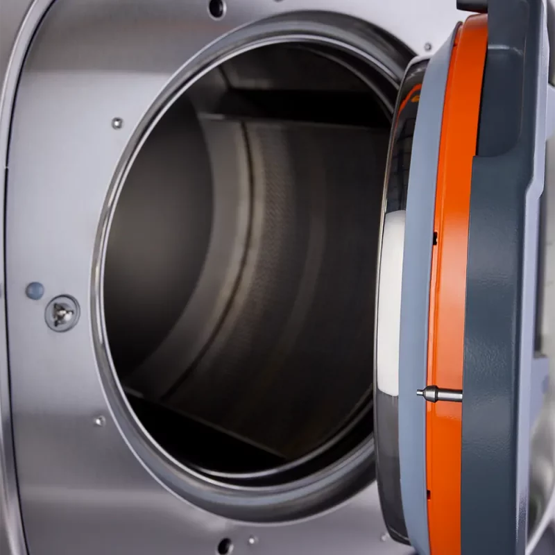 Close-up of Ready Rack™ Smart-Wash 62 extractor washer door showing heavy-duty construction and secure locking mechanism.