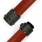 Red Kochek RCEP nitrile/PVC rubber covered hose with ribbed texture and black threaded couplings on each end.