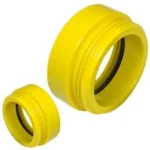 Yellow Kochek hydrant conversion bushing with set screw, shown in two sizes with black rubber gasket seal.